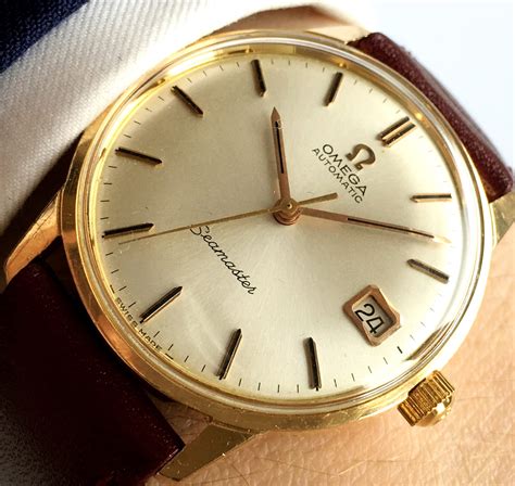 vintage omega 18k gold watch